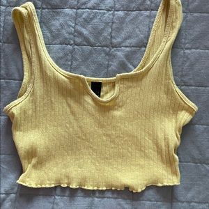 Cropped yellow top with boob slit